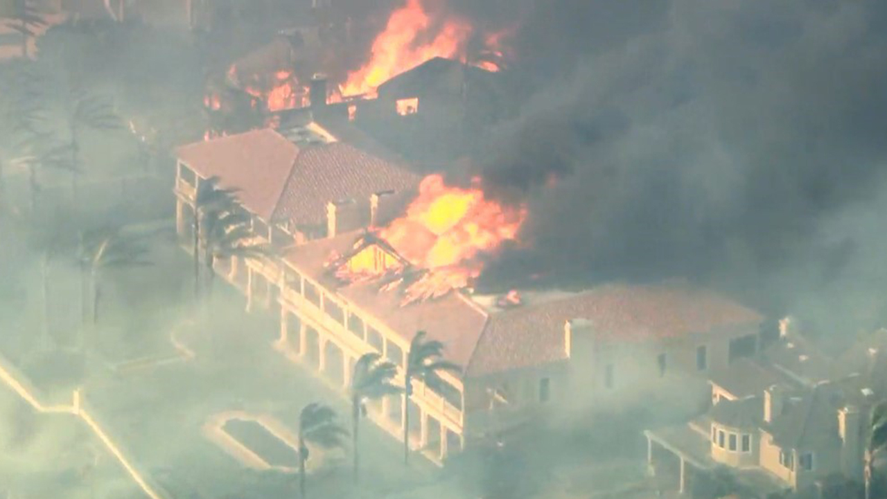 Southern California fire torches million-dollar coastal homes as blaze continues to grow