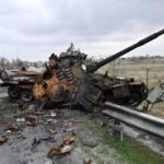 A destroyed Russian tank on a road in the Kyiv region on April 16.